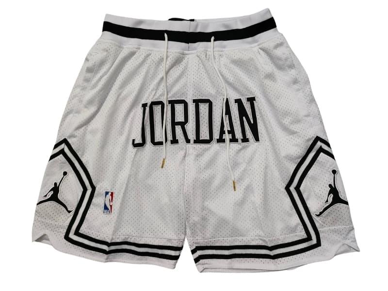 Front view of Air Jordan Spirit Diamond White Shorts featuring a clean white design with subtle Jordan branding.