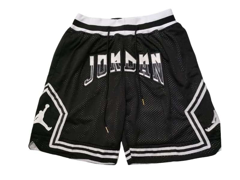 Front view of Jordan Sport Diamond Black Shorts with a sleek black design and subtle Jordan branding.