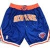 Front view of New York Knicks Icon Edition Swingman Shorts featuring a classic design with the Knicks logo and team colors.