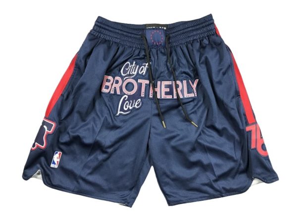 Front view of Philadelphia 76ers Navy Shorts featuring the team logo and a clean design.